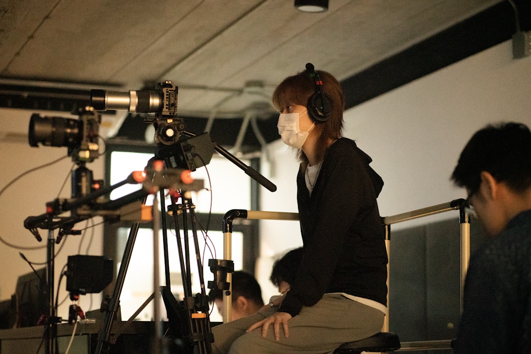 why did amanda peet leave brockmire - Filmmaker wearing headphones and mask with camera equipment